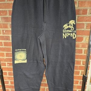 Nomad Black Sweatpants with Gold Accents